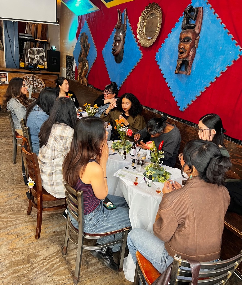 Attendees blending their own perfume at an EVE workshop